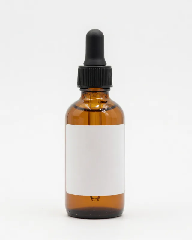 Packshot of a serum bottle on a white background